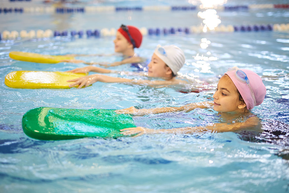 children-learning-to-swim